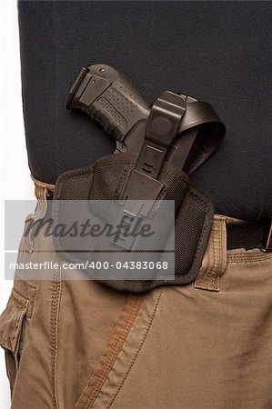 man wearing uniform with gun hanging to belt