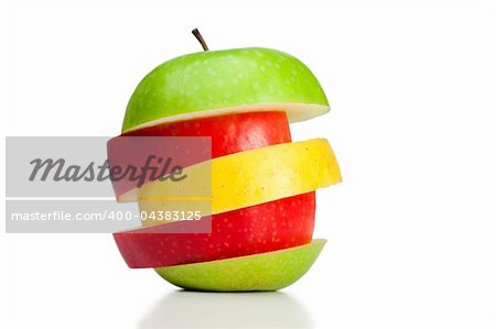 Combination of green, yellow and red apples on a white background