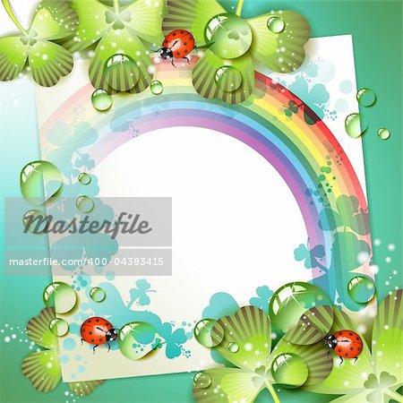 Sheet of paper with rainbow and clover over springtime background