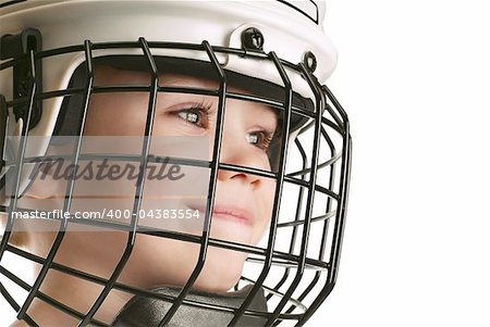 Young boy in hockey helmet isolated on pure white background
