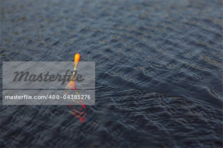 Fishing Bobber on the water. Very shallow DOF