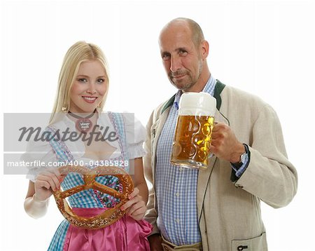 Woman in Dirndl and Man in Leather Trousers