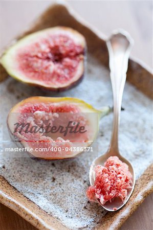 Delicious, fresh and ripe fig halves. Studio shot.