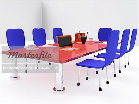 Conference room with red desk and blue chairs
