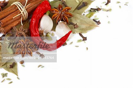 Colorful dried spices on a white background.