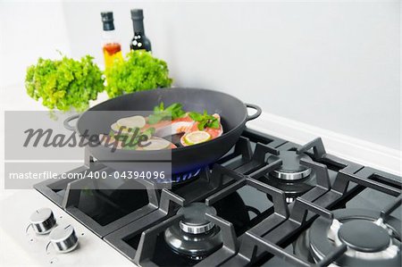 vegetables dish prepared in a black skillet in the kitchen