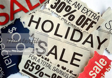 Various holiday on sale signs from the newspapers