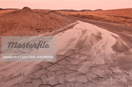 Mud Volcanoes and a sky with clouds