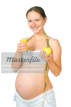 young pregnant woman with a glass of juice