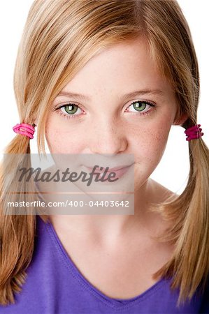 Beautiful cute sincere face of happy teenager girl with pigtails, blond hair, green eyes and freckles, isolated.