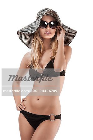 glamour shot of a beautiful girl in bikini and dark sunglasses