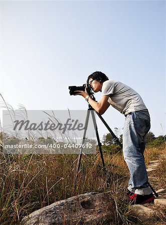 Photographer taking photo at wild