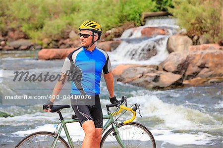 Bike rider by the river