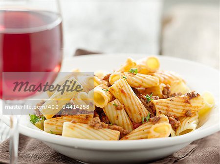 rigatoni pasta with tomato meat sauce and wine