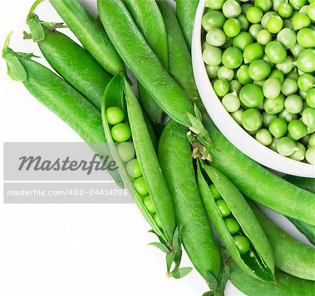 Green peas in the white plate  isoladed on white background