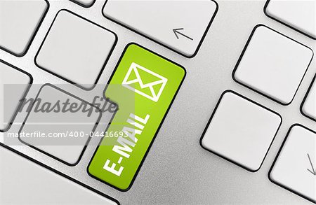 E-mail button on modern aluminum keyboard.