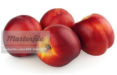 Four nectarines isolated on a white background