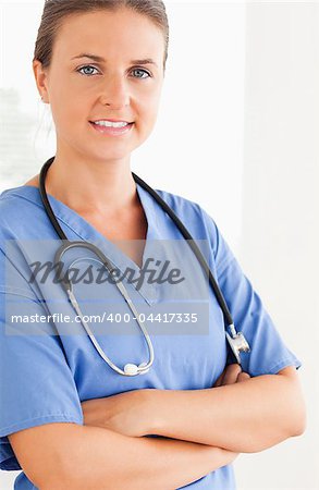 Close up of a nurse posing while standing
