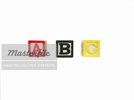 Child's multicolored letter blocks, ABC isolated on white