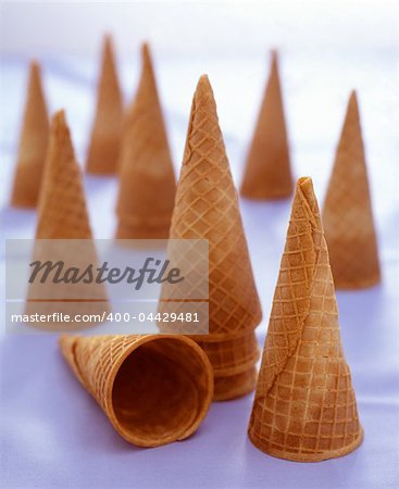 A bunch of sugar cones waiting for icecream