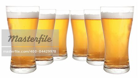 Glasses of beer isolated on white background