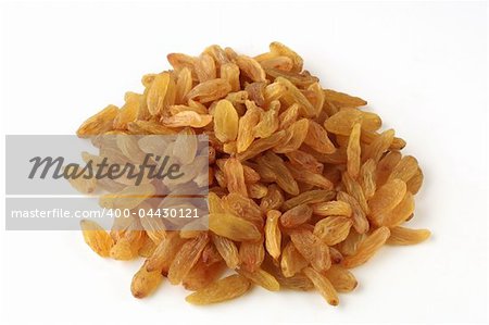 small group of golden Iranian raisins on white background