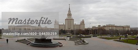 Panorama of Moscow State University in Moscow. Autumn scene.  You can see Chemical department, Main building and Physical department. In front of photographer there is a monument of M. V. Lomonosov.