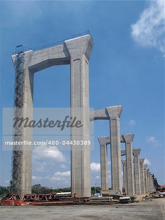 Concrete pillars of motorway bridge under construction