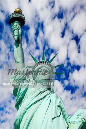 Statue of Liberty against a blue sky