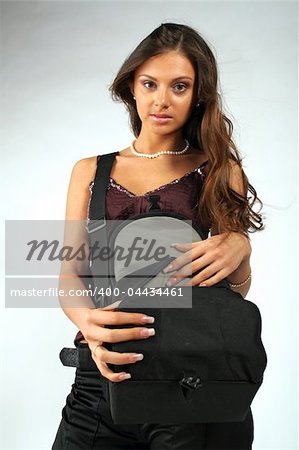 Beautiful girl with camera bag