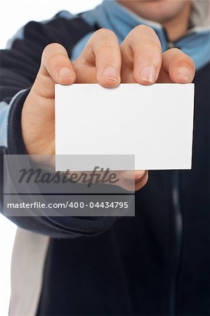 Handsome teenager showing a blank card