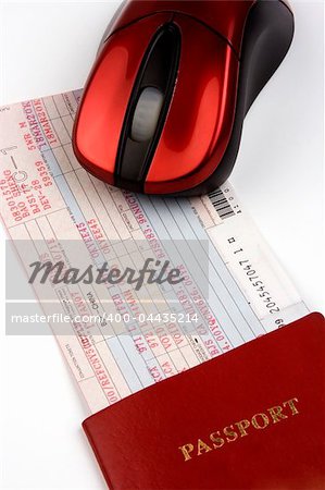Online booking airline ticket with computer mouse and passport.