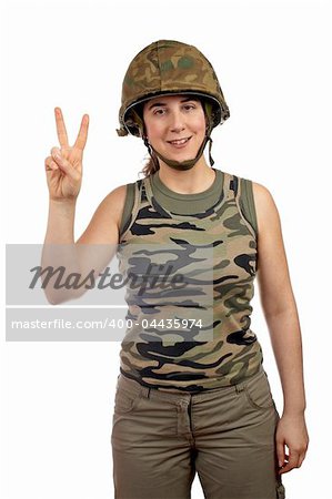 A beautiful soldier girl.  Victory gesture with the fingers