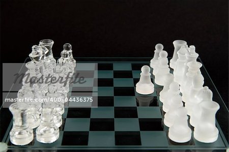 glass chess on the transparent chessboard