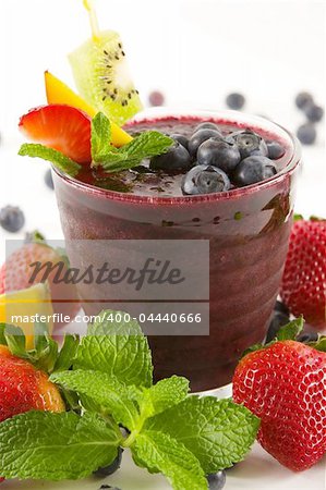 A glass of blueberry smoothie