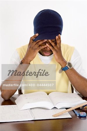 This is an image of a student suffering from academic pressure. This image can be used to represent academic and student themes.