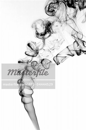 Intricate and beautiful patterns in black smoke rising into the air. Isolated on white.