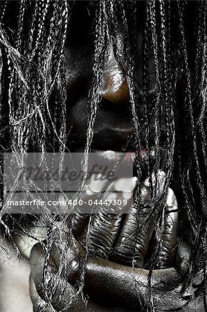 I can see you, the focus is on the hair, African witch, dramatization,