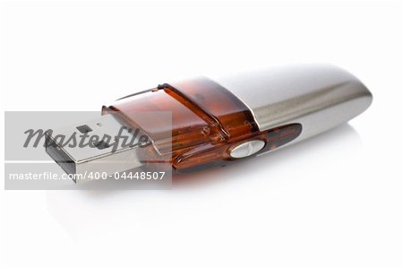 Portable flash usb pen drive memory with shadow reflected on white background. Shallow DOF