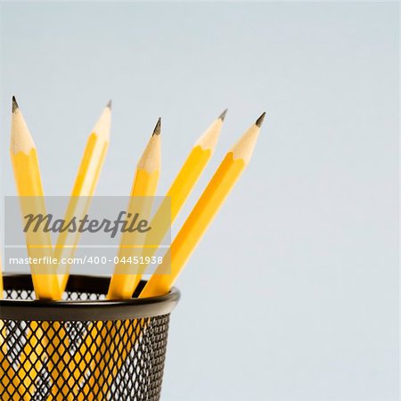 Group of pencils in pencil holder.