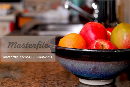 Interior of a modern kitchen with natural granite countertop