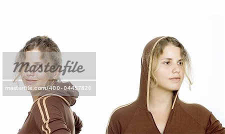 Two isolated girls wearing brown sweater