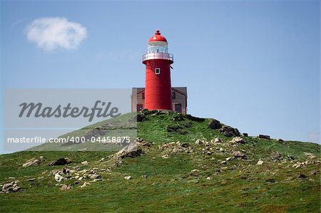 Saturated photograph of the lighthouse at Ferryland, Newfoundland, Canada.