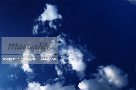 Beautiful blue sky and white clouds.  Peaceful and quiet scenery.