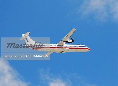Modern turboprop airplane in flight