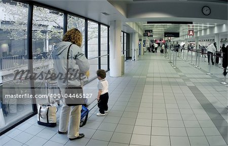 Mother and her kids at the airport