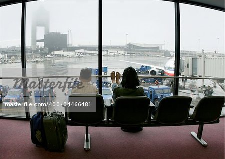 people waiting for their flight