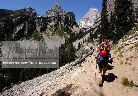 Mountaineers trekking to base camp to climb the Grand Teton