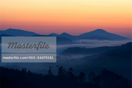 Sunrise over the fog in winter