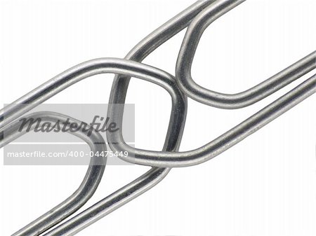 Two linked paperclips on a white background